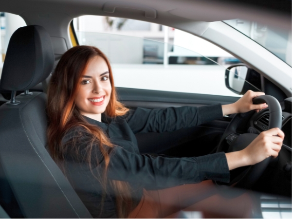 Woman Driving a Car