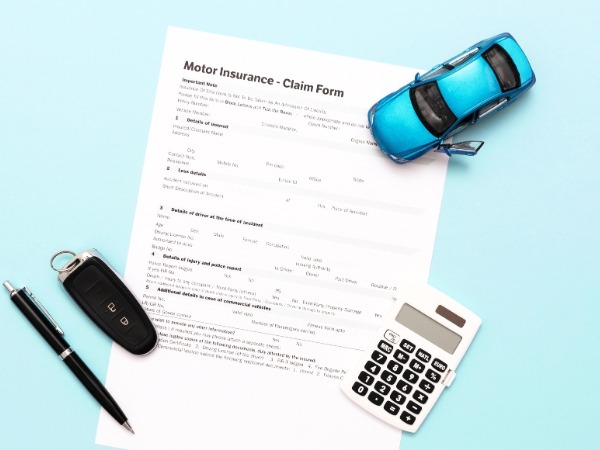 Mini Blue Car with Insurance Claim Form