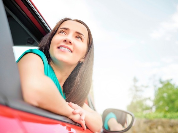 Woman Looking Out a Car Window
