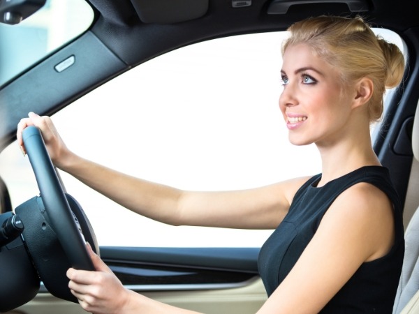 Woman Driving a Car