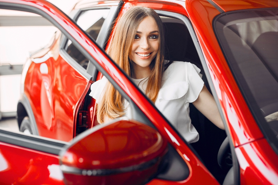 Woman with a Rental Car