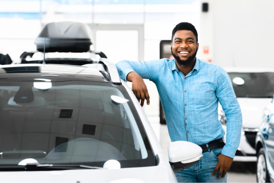 Man Driving a White Car